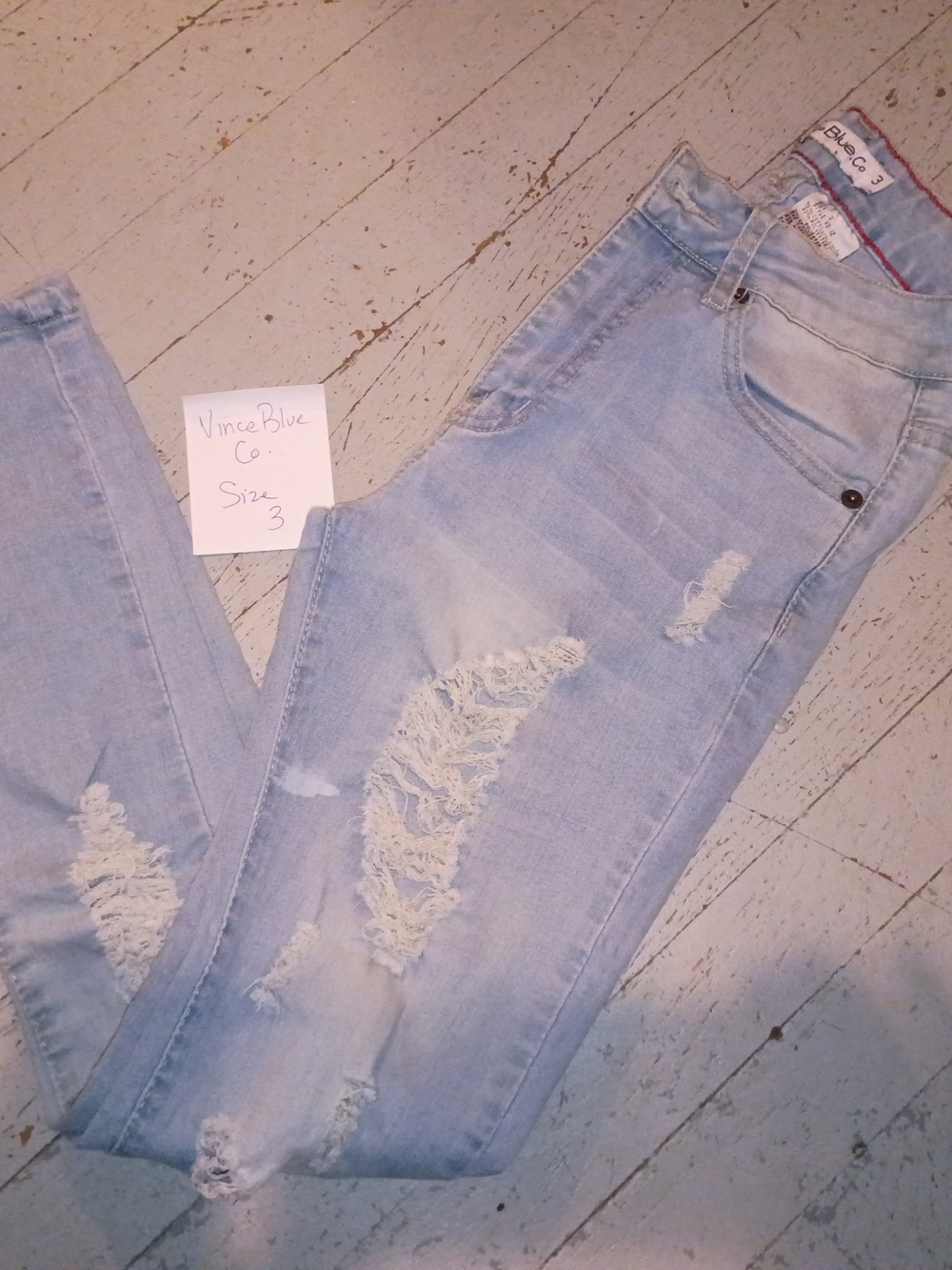 Light Wash Ripped Skinny Jeans - Women